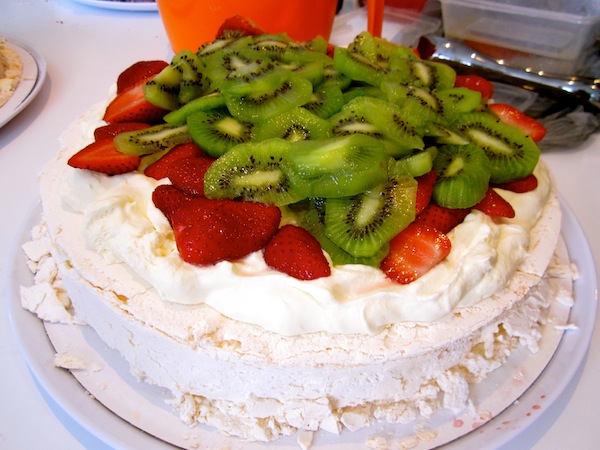 Traditional Australia meringue pavlova with kiwi and strawberries