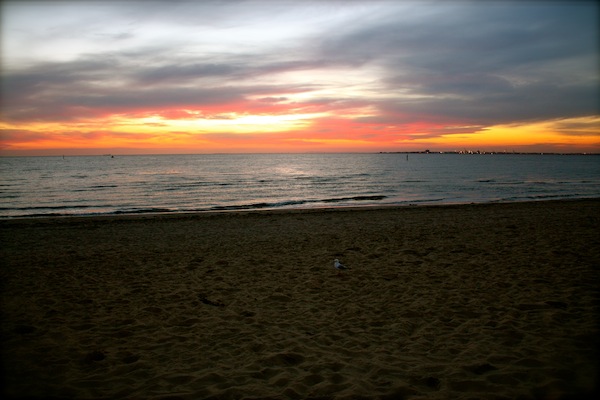 View of sunset over Port Phillip Bay from St Kilda Beach