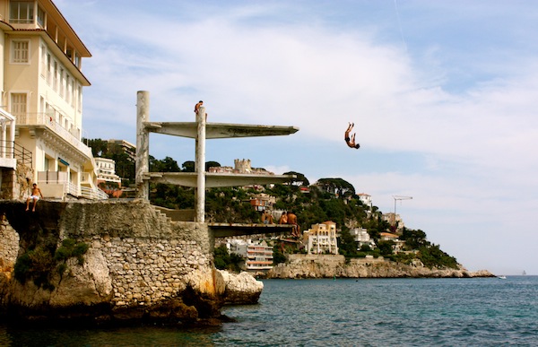 Jumping off the diving board at La Reserve, Le Plongeoir in Nice, France