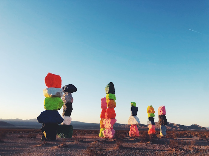 Seven Magic Mountains art installation in Las Vegas desert at sunrise